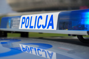 Belka sygnałowa z napisem policja