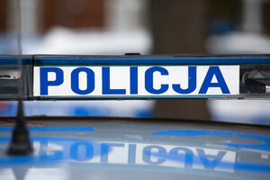 Belka sygnałowa z napisem policja