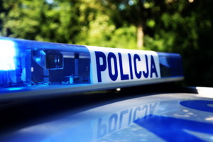 Belka sygnałowa z napisem Policja